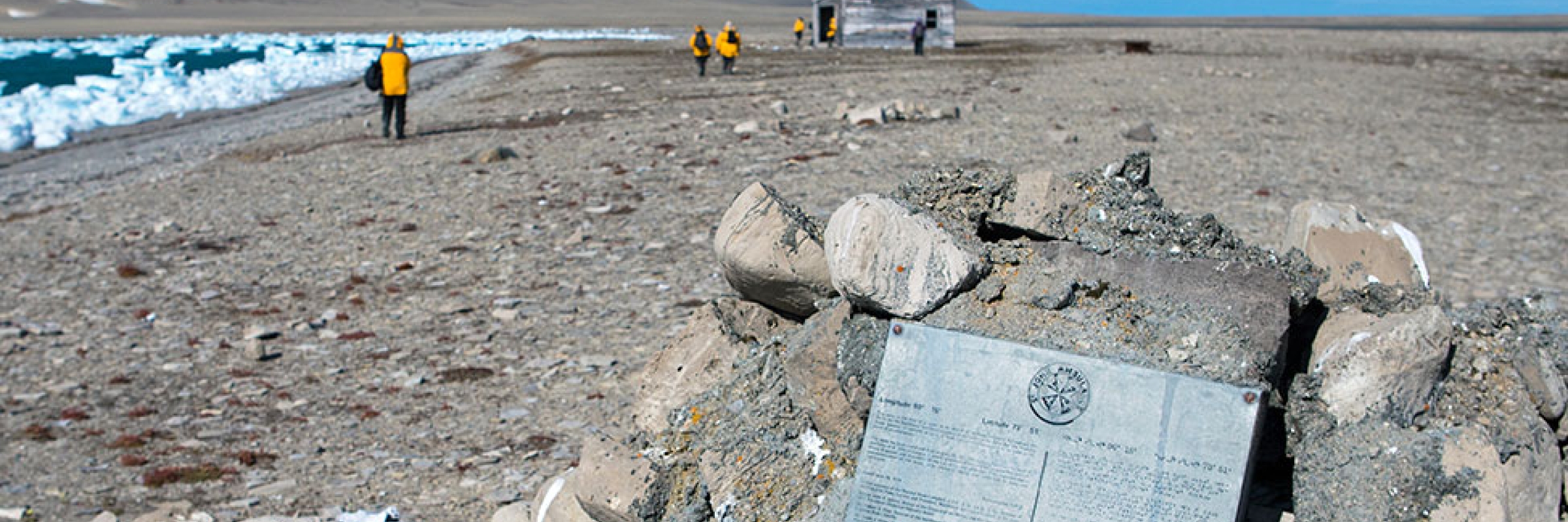 Guests exploring expedition relics in the Canadian High Arctic