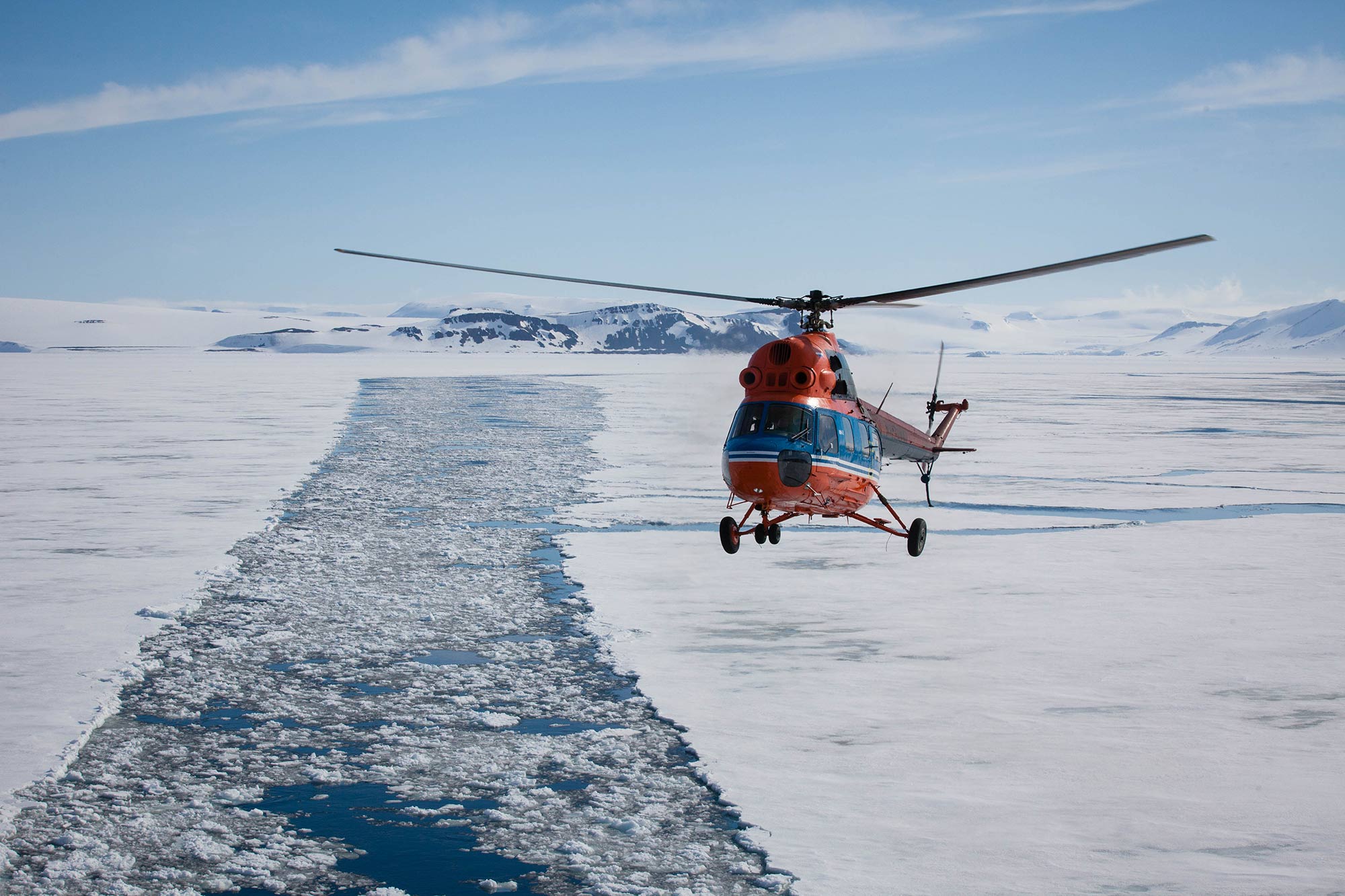 Helicopter in Arctic landscape