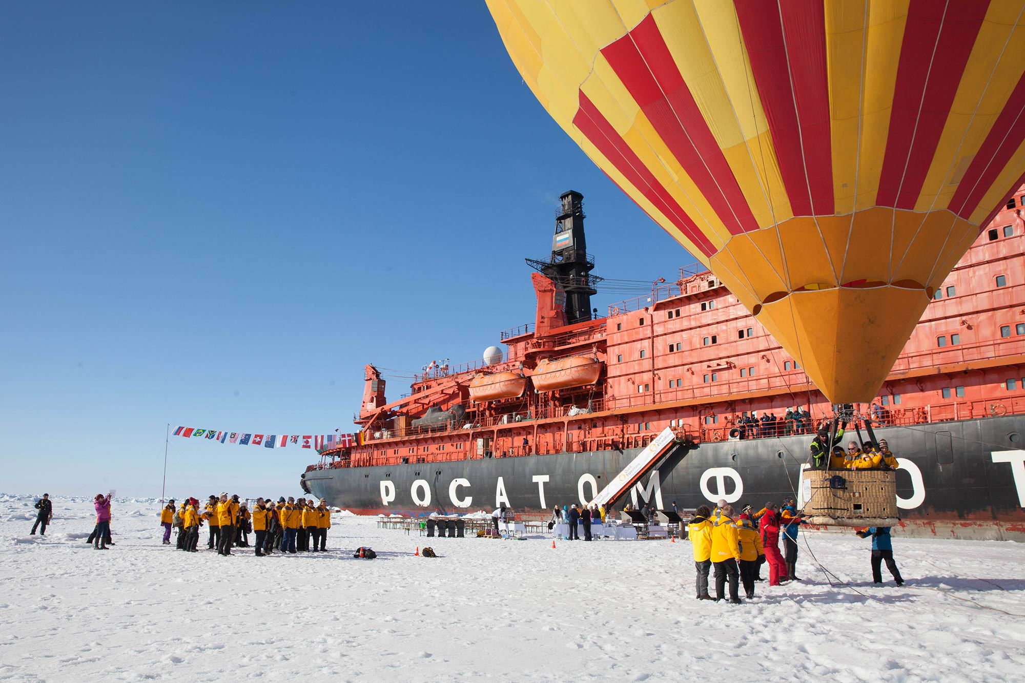 Passengers taking off on hot air balloon