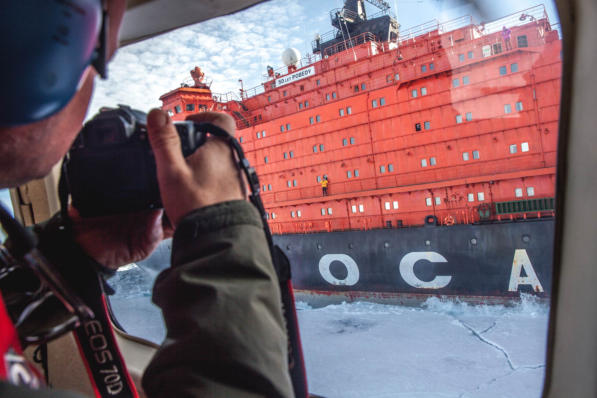 Passenger taking a photo from the helicopter