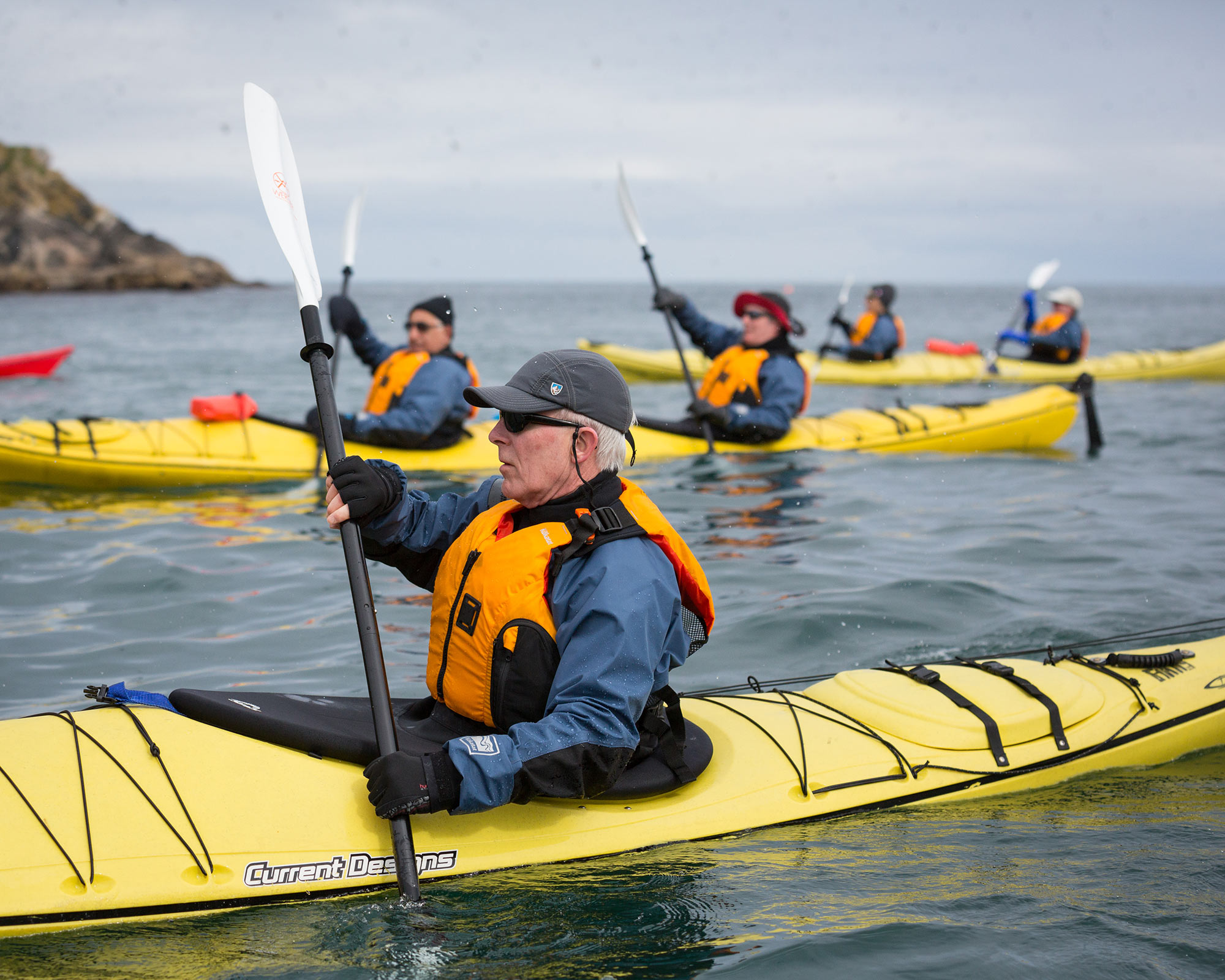 Passengers kayaking near the Norwegian Coast