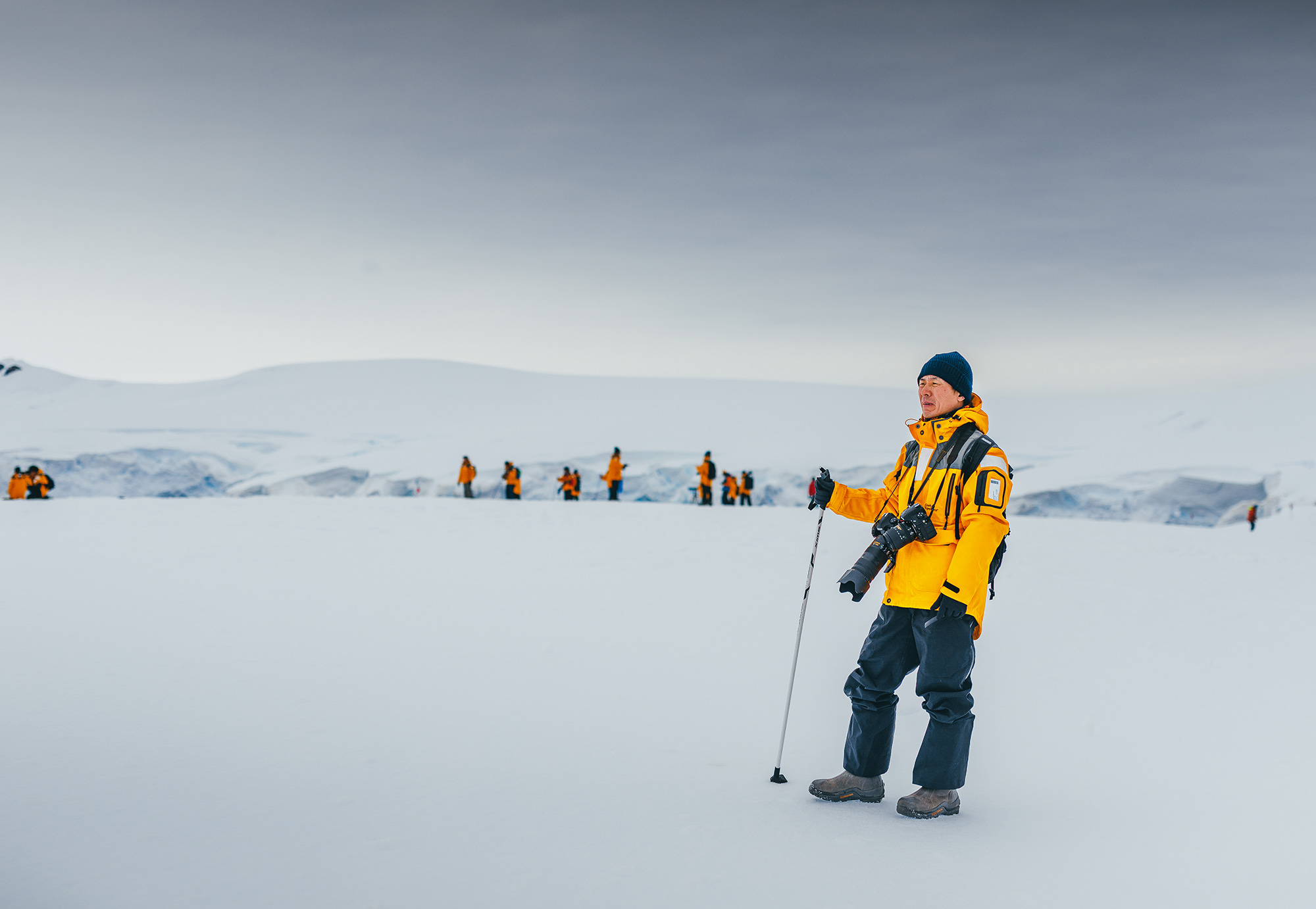 Passengers hiking in Antarctic Landscape