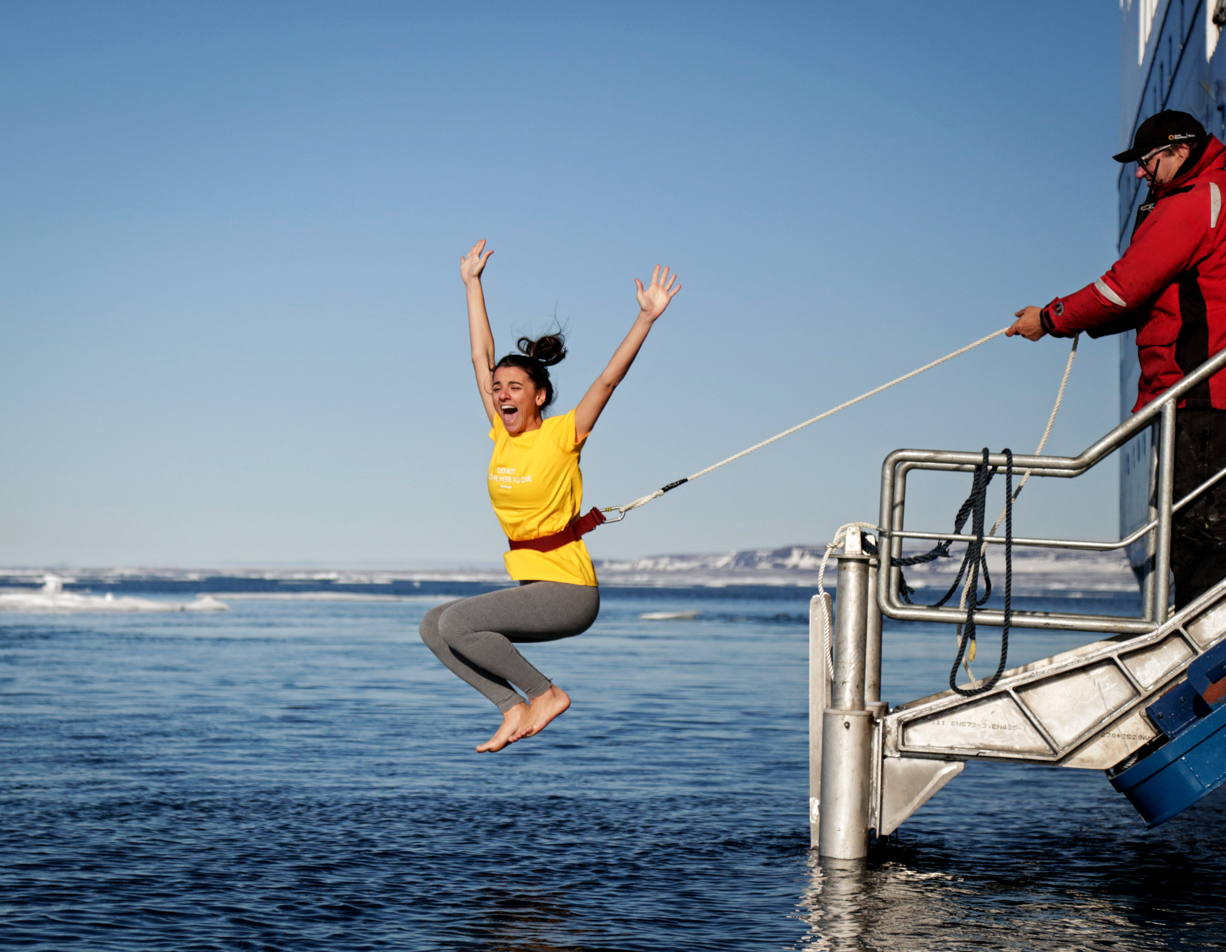 Passenger enjoying the polar plunge experience in Svalbard