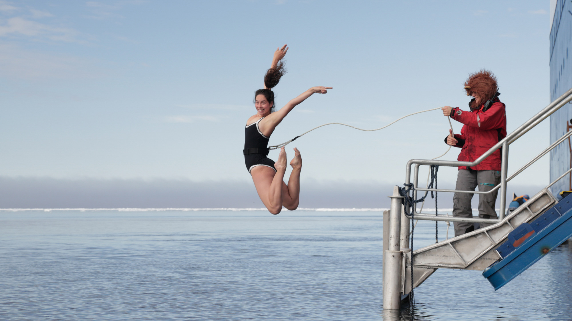 Passenger enjoying the Polar Plunge experience in Svalbard